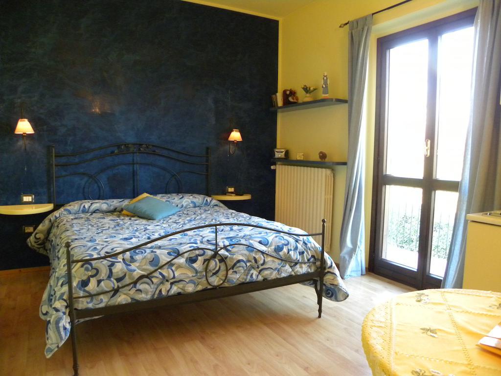 Agriturismo Fano's Farm Suno Habitación foto